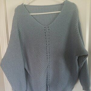 Long sleeved blue sweater